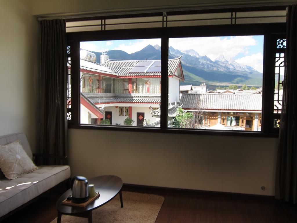 Lijiang Baisha There International Youth Hostel Ruang foto